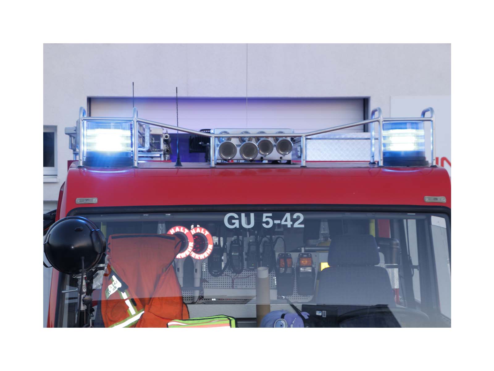 B2 Rhodon Max Basic Blue In Situ 2 Lit on Top of Fire Vehicle Viewed from Front and Closely Cropped