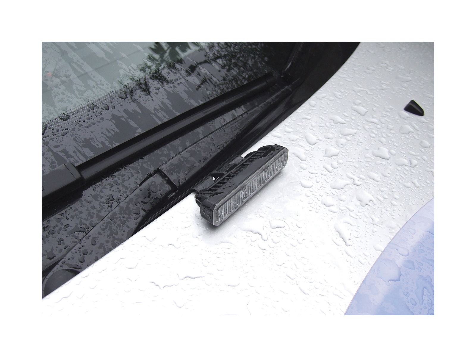 Mini Stealth - 6-way Flush Fit (Hood Mount) LED Modules In Situ Clipped onto Bonnet of Silver Car Unlit in the Rain