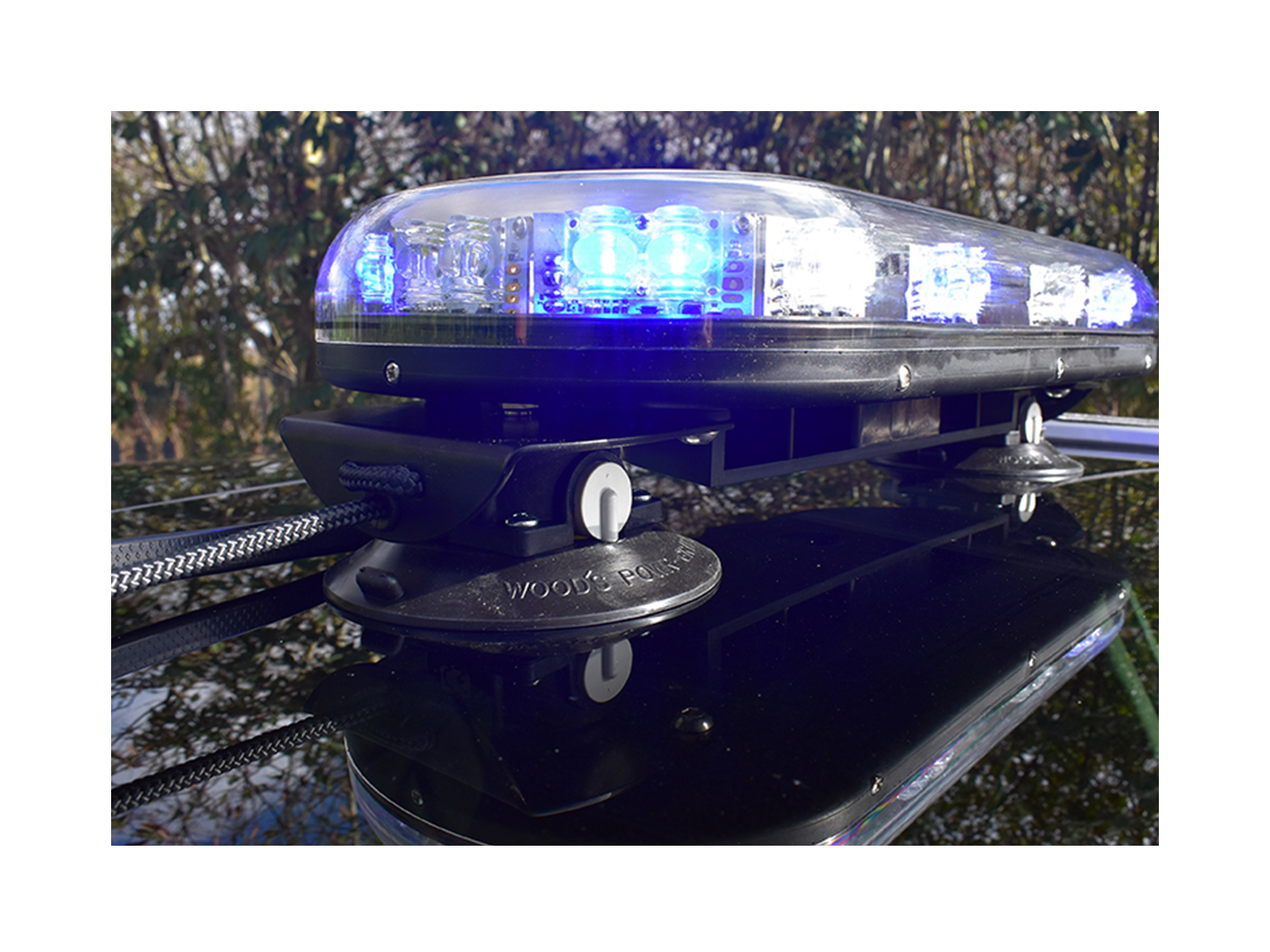 Trail Blazer 2 LED Mini Lightbar Clear Angle View Blue White Lit In Situ on Black Car Roof