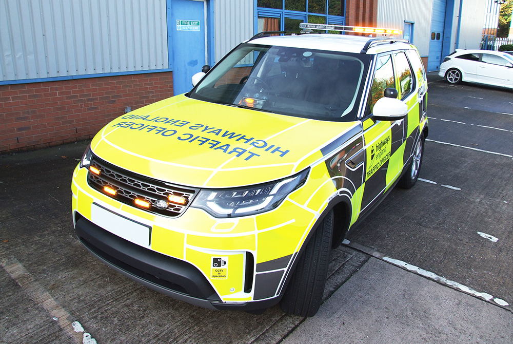 Highways England Standby UK Installation Angle View In Front of Unit and White Car Ligthbar Lit on One Side